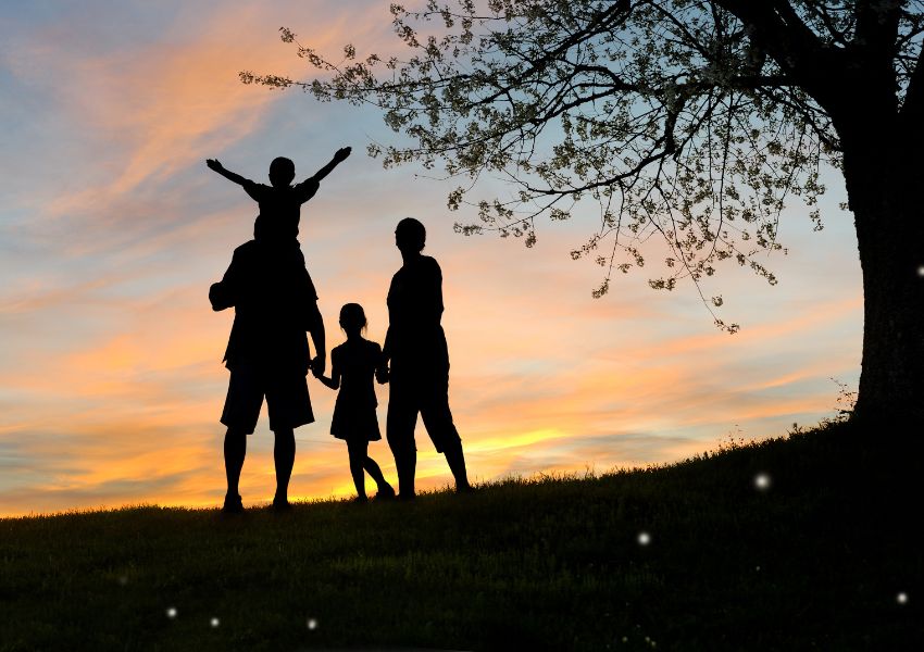 shadowed-family-under-tree